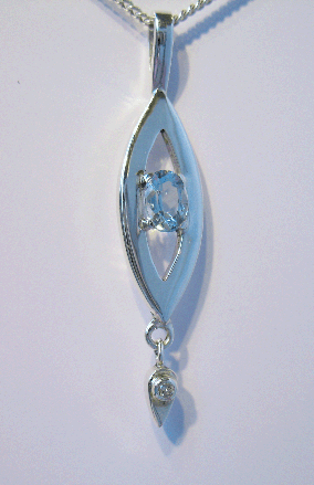 Silver handmade pendant with Aquamarine
